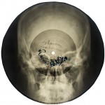x-ray of a skull transformed into a a vinyl record