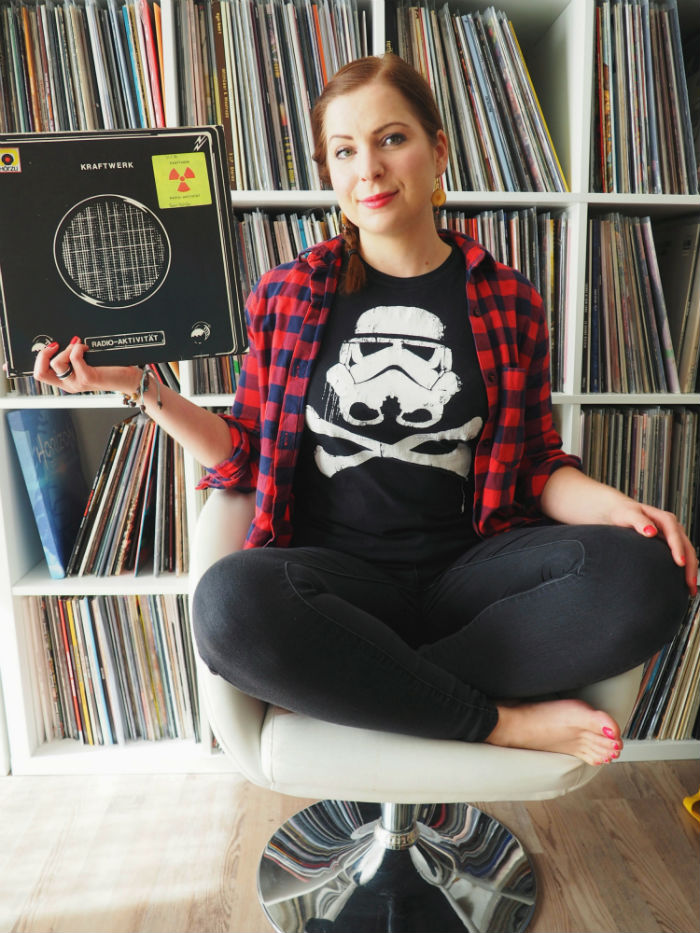 diana holding an album from kraftwerk